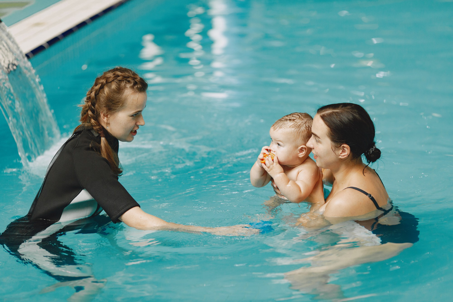 WaterWaves swim instructors working with students in the pool